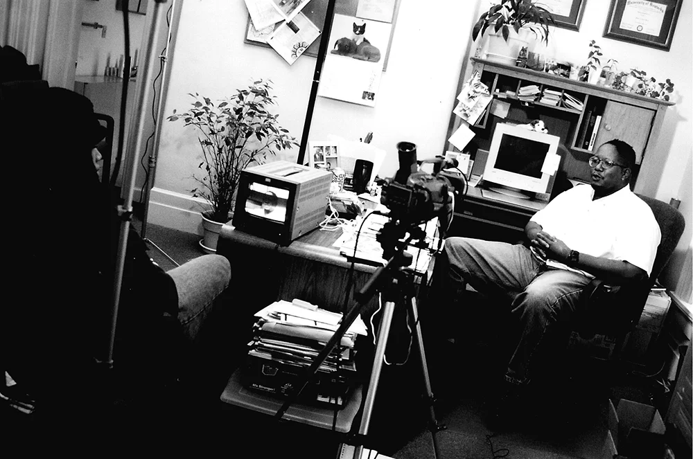 NO! Production Still: Aishah Shahidah Simmons and featured interviewee John T. Dickerson__Joan Brannon, Photographer ©1999