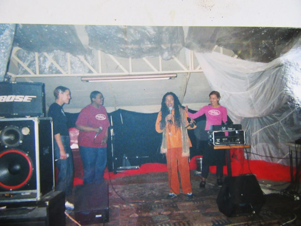 Aishah on stage with hiphop trio Meufia in Paris France, ©2001