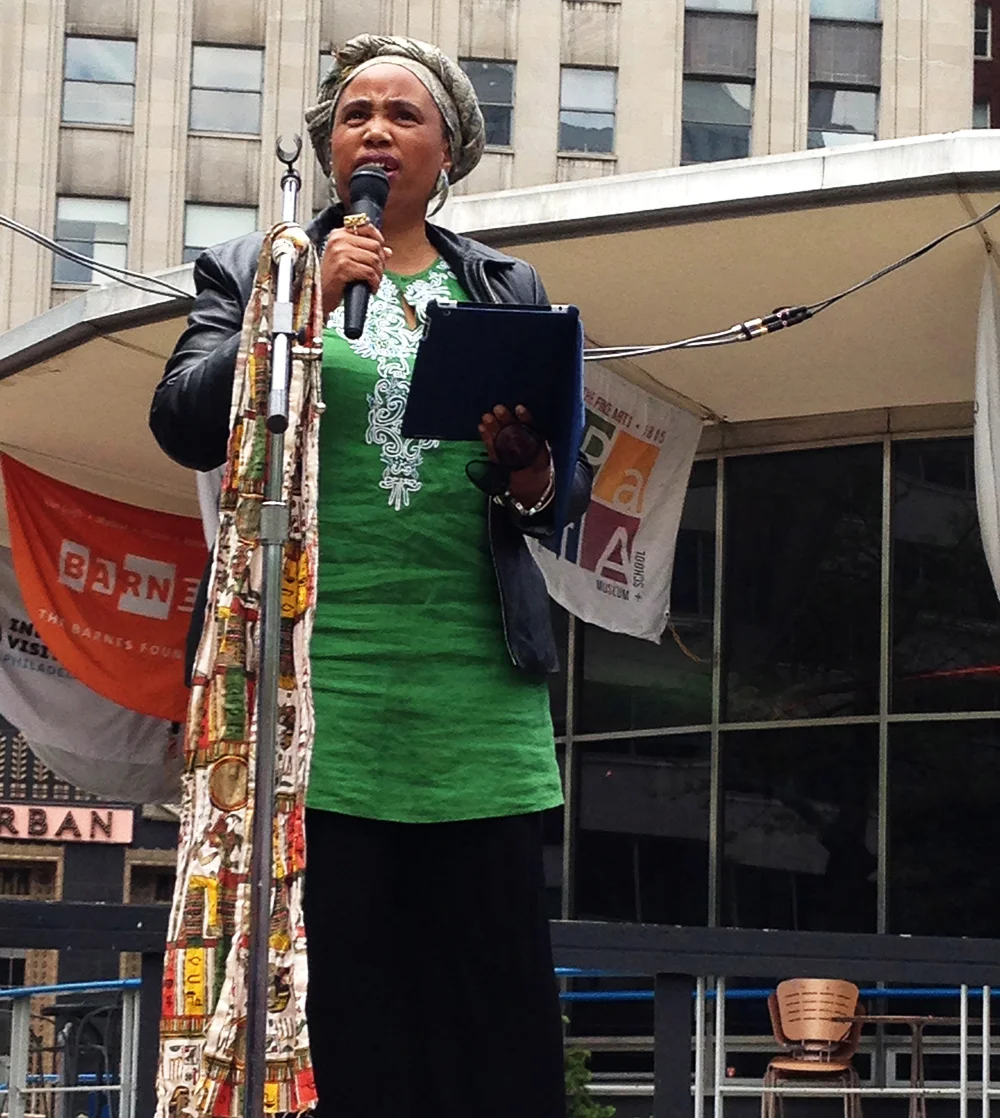 Aishah Shahidah Simmons speaking at the Rock A Gele for Our Girls: #BringBackOurGirls Rally in Philadelphia © 2014