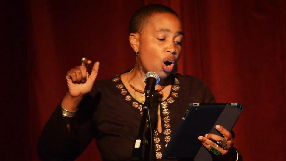 Aishah Shahidah Simmons performing “A State of Rage” at One World Poetry Night in Berlin, Germany_ Arne Shultz © 2015
