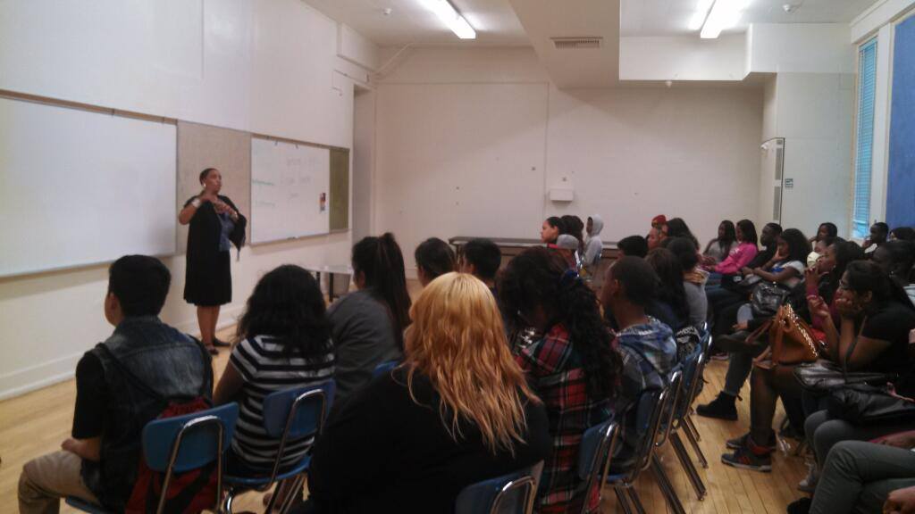 Aishah Shahidah Simmons facilitating a dialogue about sexual and gender-based violence to high school students at the Women’s Leadership Project International Women’s Day Program at Washington Preparatory High School, Los Angeles, CA, © 2014