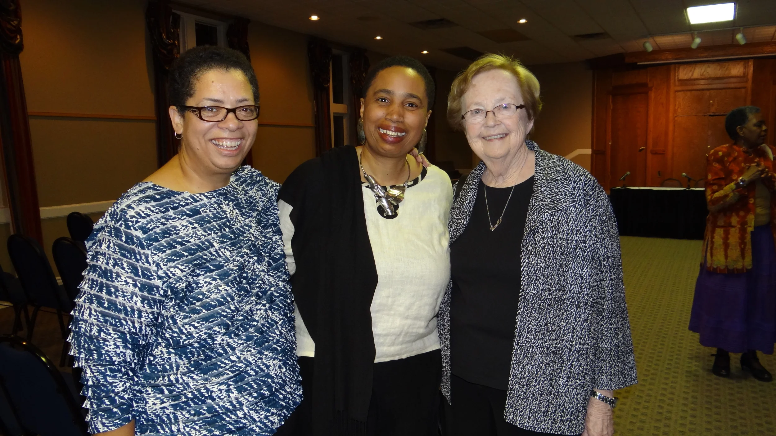  Pat Clark, Aishah Shahidah Simmons,&nbsp;and Inelle Cox Bagwell with Valerie Ann Johnson (in the background) at the Scarritt Bennett Center in Nashville, Tennessee in 2012. 