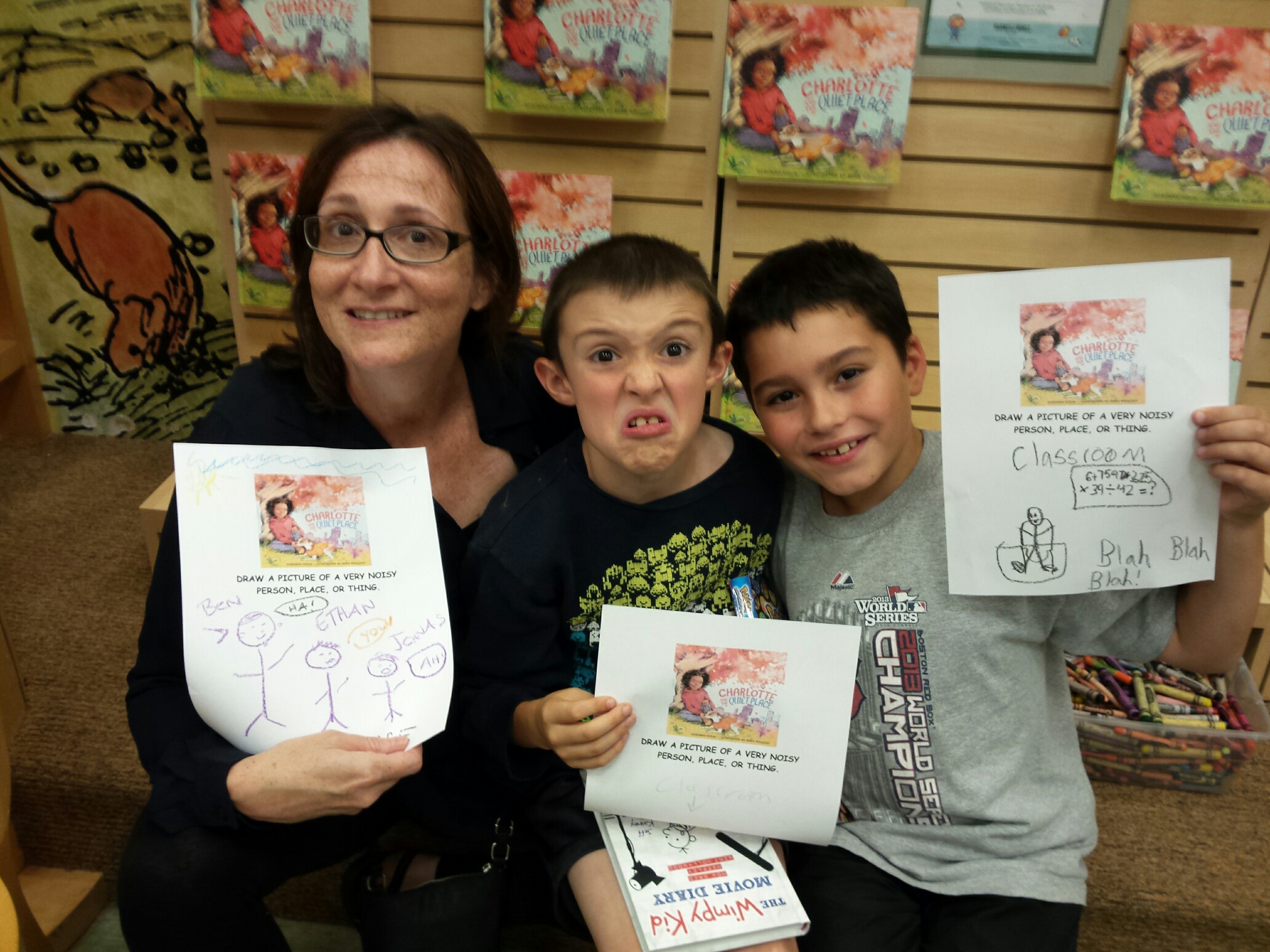 Amy and her kids draw their noisy places.