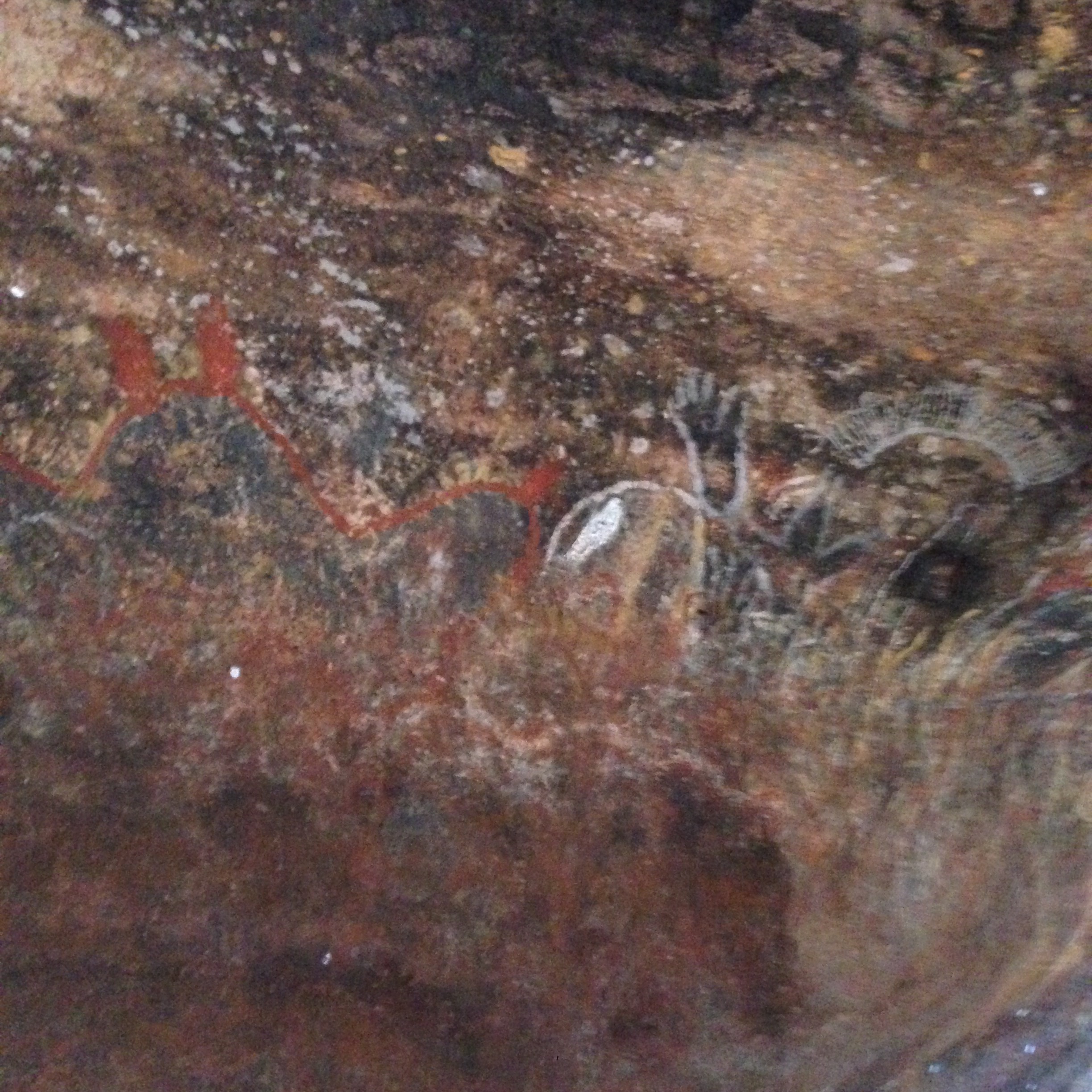 Pictographs in cave in Uluru-Kata Tjuta National Park, Northern Territory, Australia