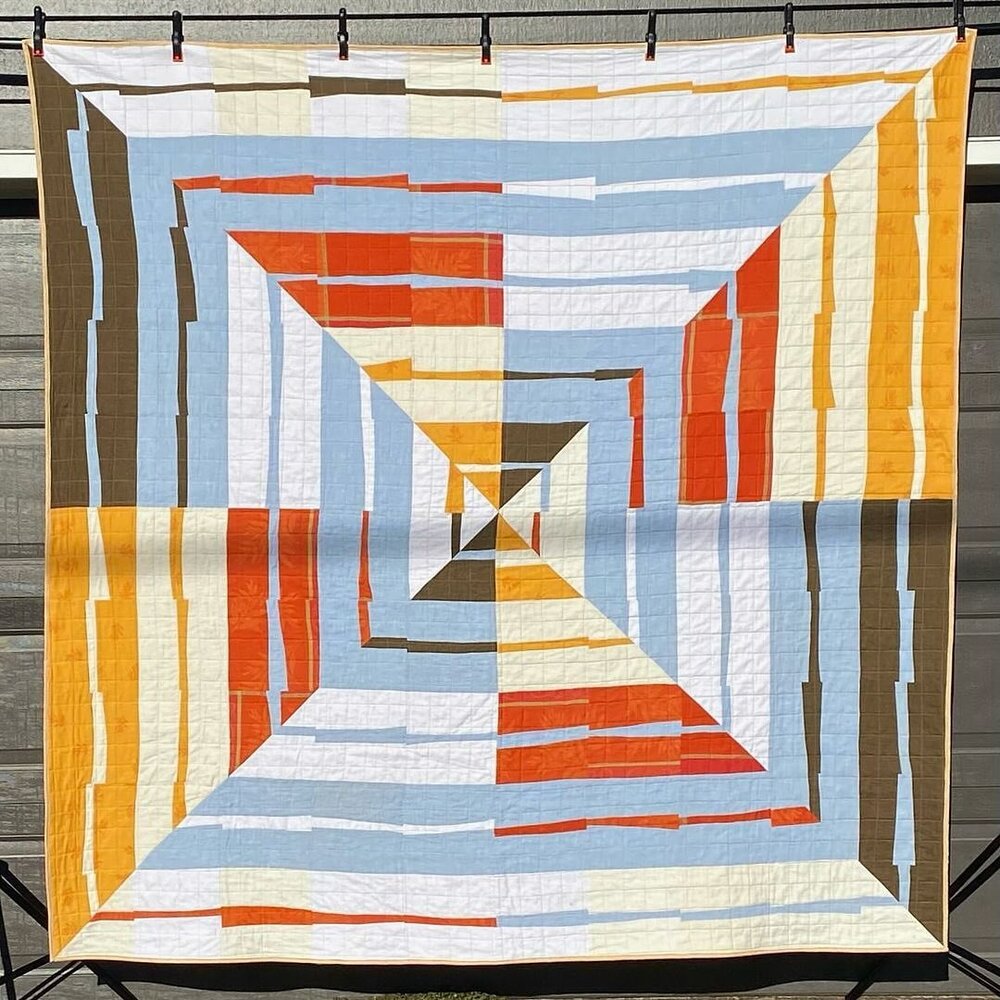 Day 31 FAVORITE POST. NOT MY WORK.  Repost from @laurashaw.quilts
&bull;
Day 10: recycle, reuse ♻️ 

Almost every quilt I make has some recycled fabric but this one is ALL recycled. 

Made from a torn-but-loved tablecloth we got in Italy (orange and 