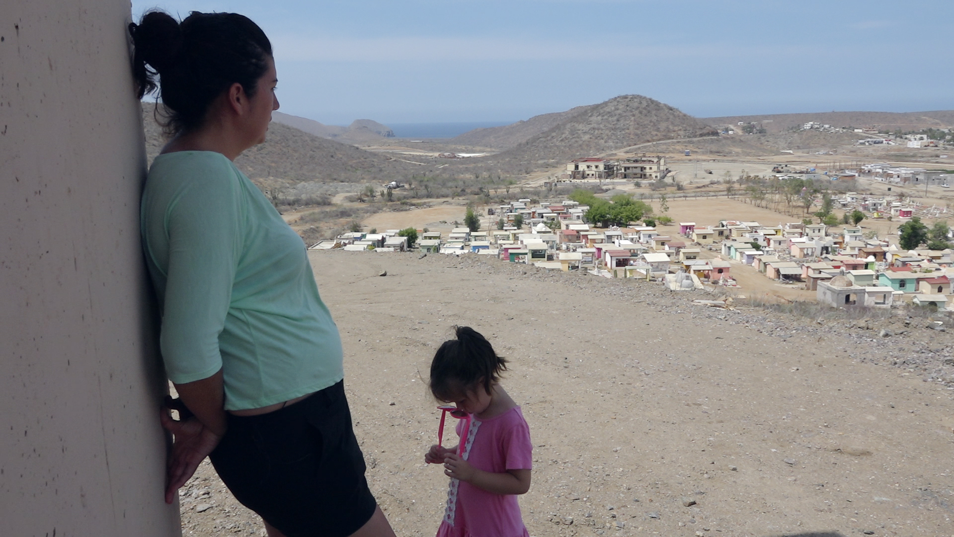  Maria Salvatierra and her daughter at Todos Santos Center of Colorado State University, part of the Tres Santos mega-development 