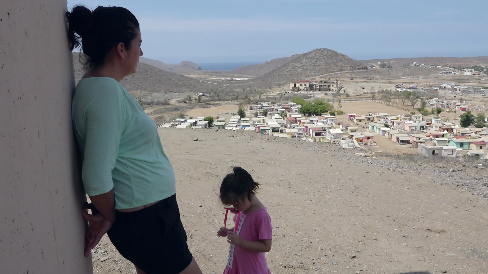 Maria Salvatierra and her daughter at Todos Santos Center of Colorado State University, part of the Tres Santos mega-development