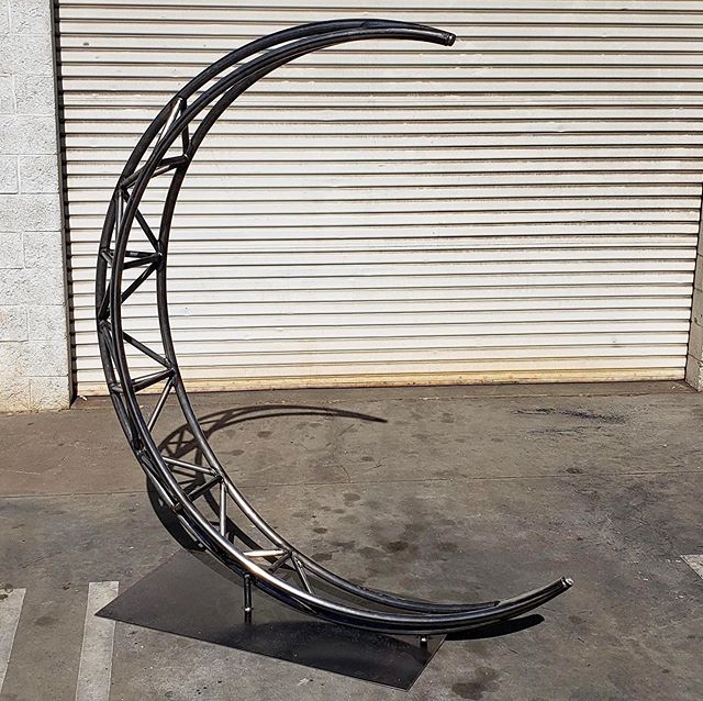 We are over the #trusse moon 🌙 to share this beautiful new piece with everyone!  The Crescent Moon is made from steel and can be finished in various colors. Pictured here you have raw material and then finished to look like aluminum.  Stay tuned for