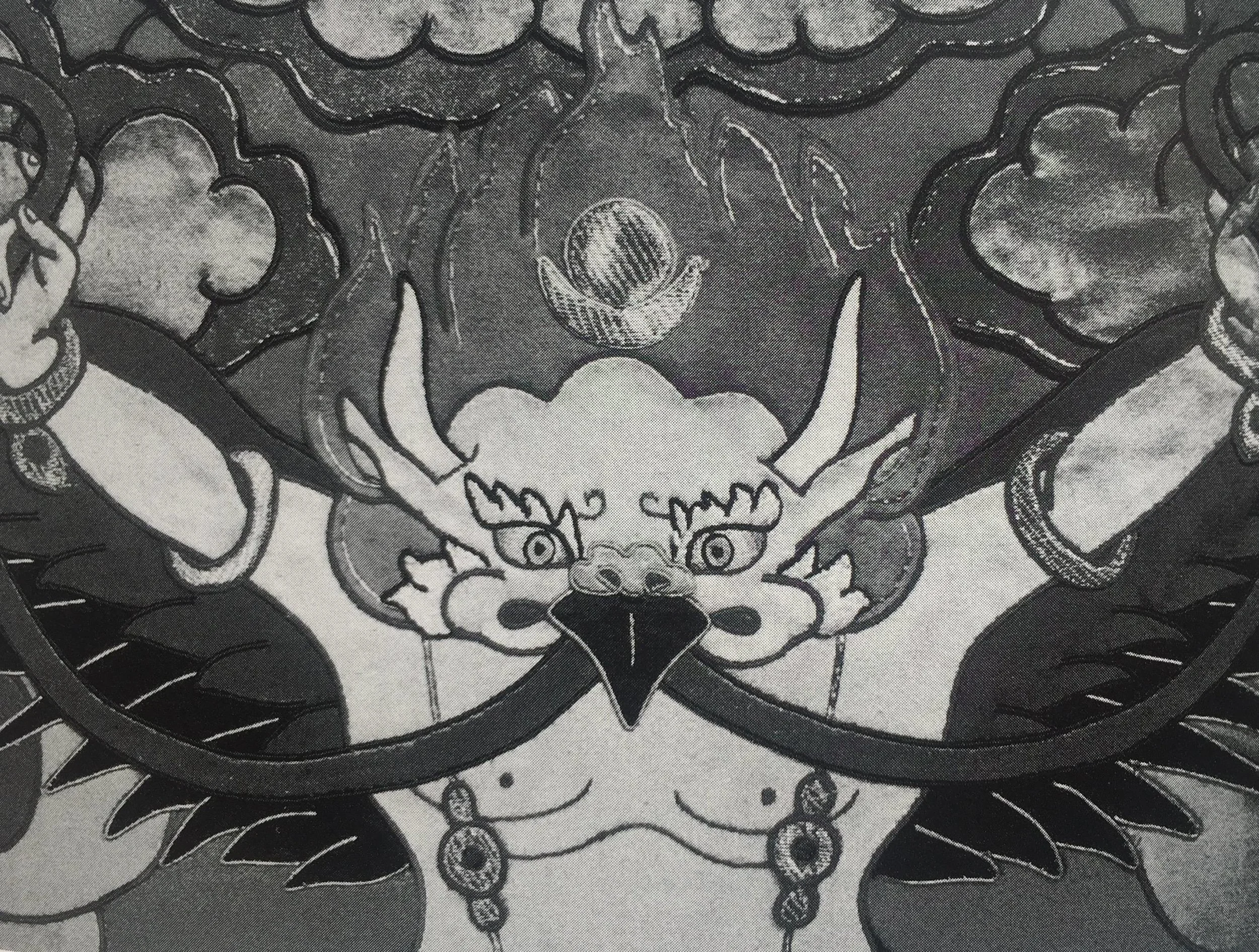 garuda holding a snake .jpg