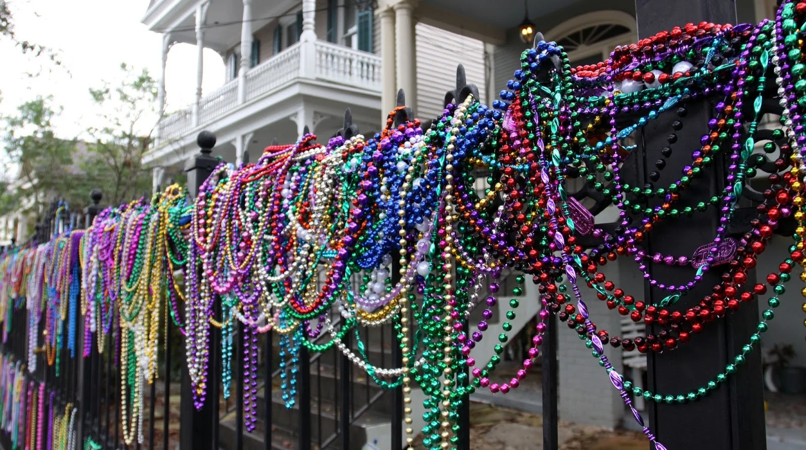 Colorful strands of Mardi Gras beads. Photo via Baton Rouge Moms . 