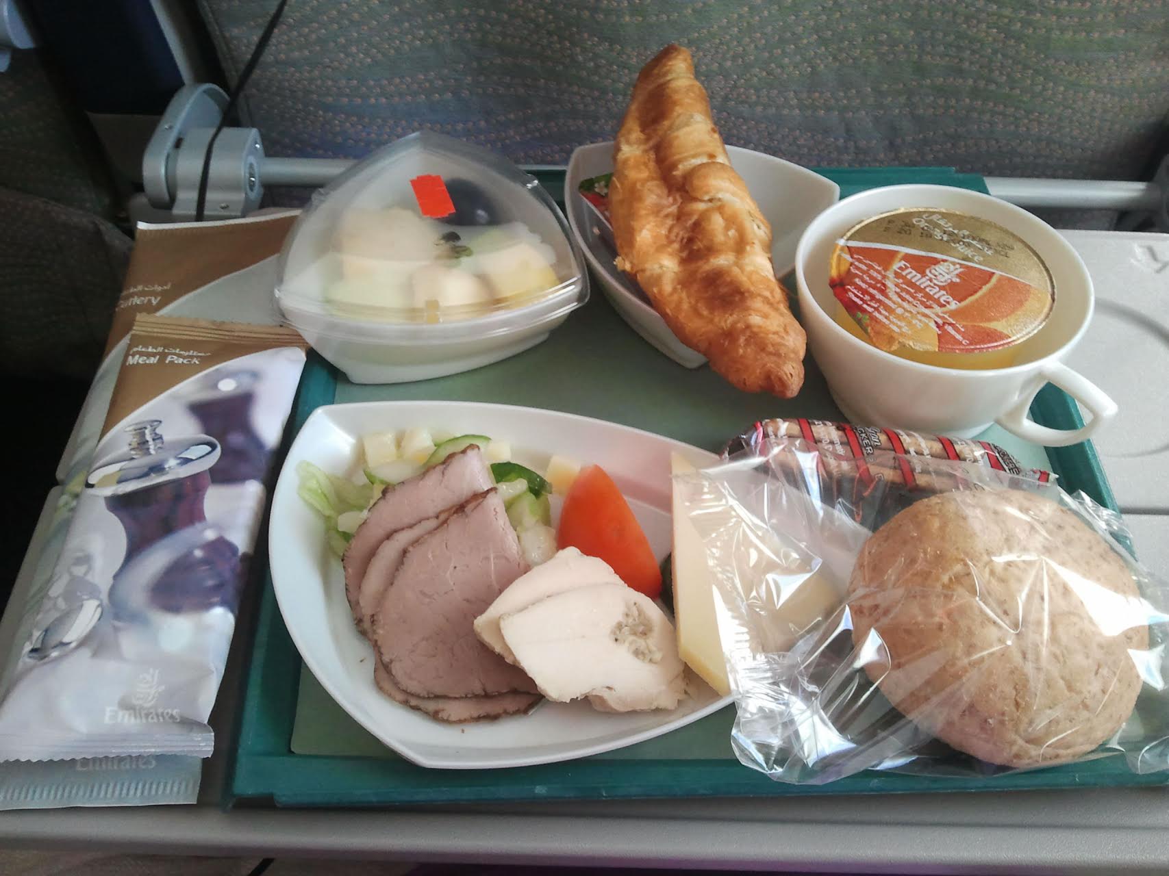 Plastic-wrapped food on an Emirates flight. Photo by Nicolas Delaunay. 