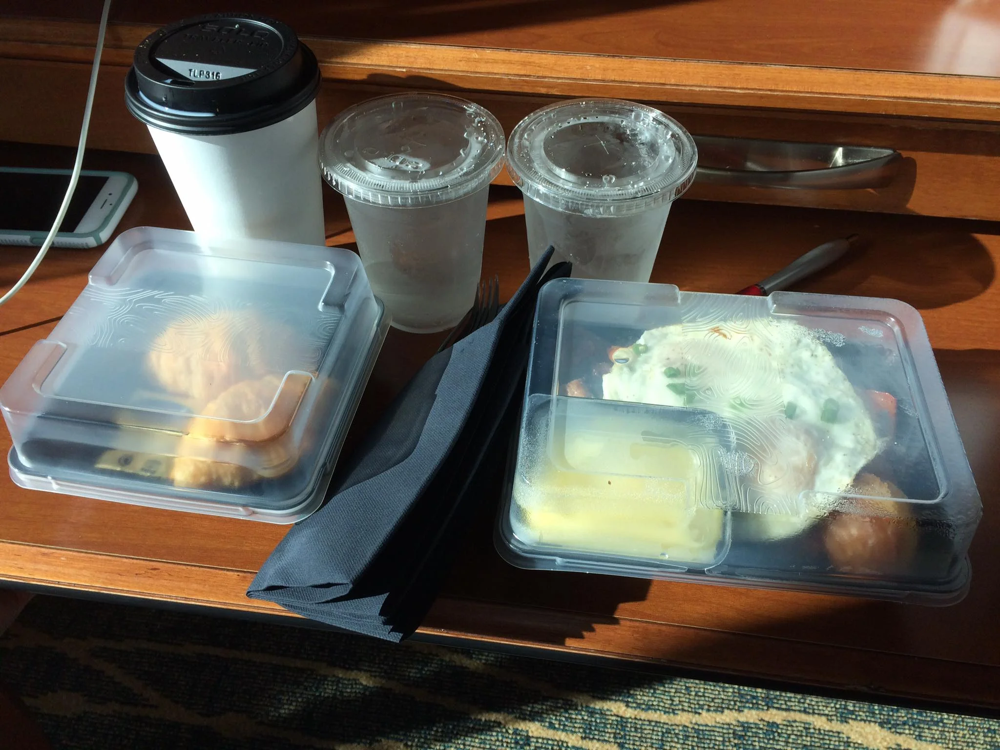 Photo of plastic containers from a Seattle-area Marriott by Raj Mahakul.