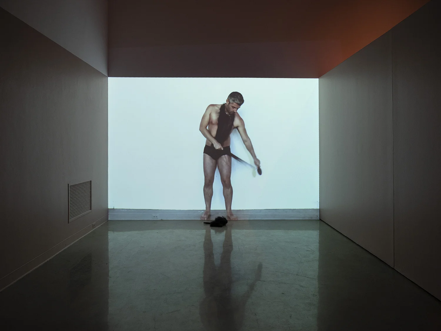Hackles , 2017 Performance for video. and where is the body?, 2018 ArtLab, Western University. London, ON Photo: Mark Kasumovic