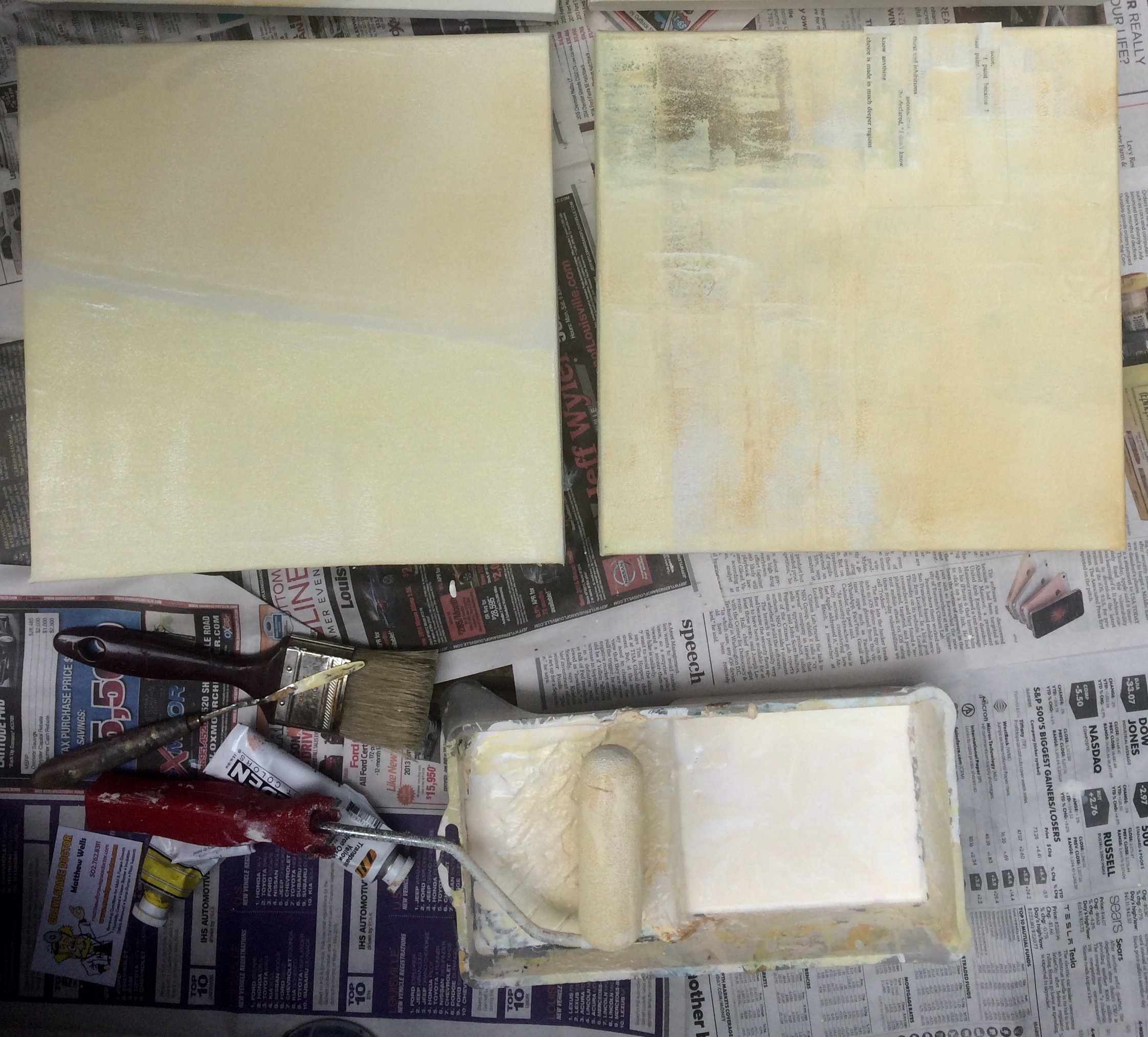 Applying house paint, tinted with Golden acrylic, for the second layer.