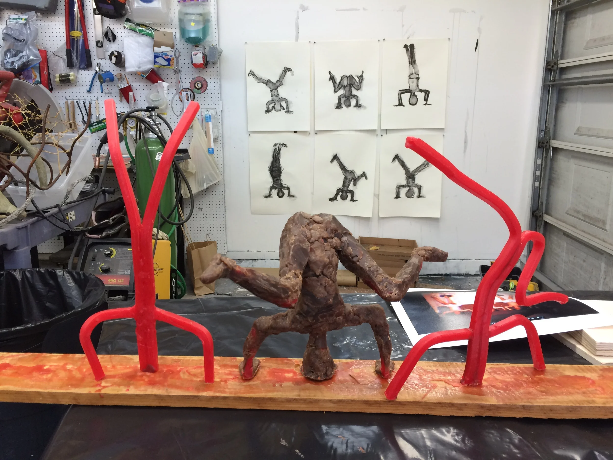 Playing with the positions of each piece. They will be mounted on one or maybe three concrete cushions. I will make the cushions like the happy dog sculptures dog bed (See my website under sculptures in the portfolio). They will be made after these are cast in bronze. 