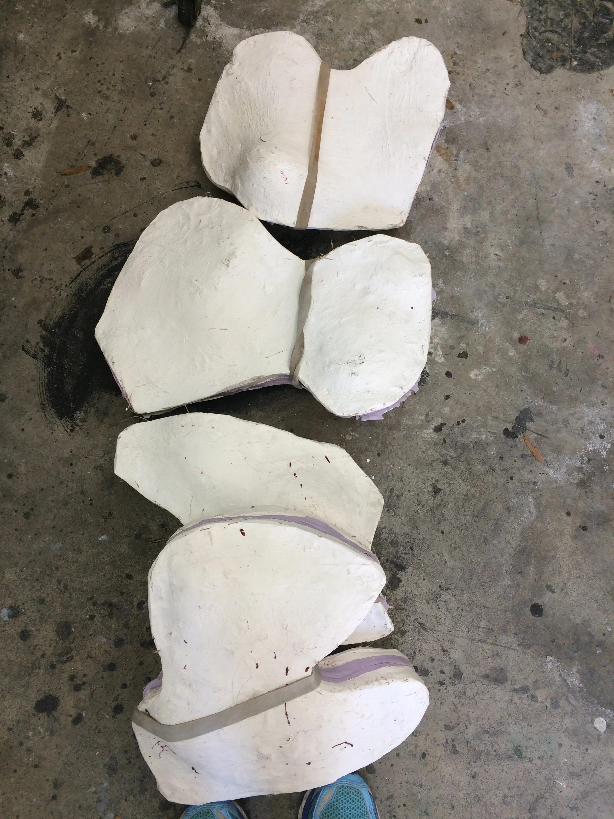 The 3 headstands and serendipity molds held together with giant rubberbands. 