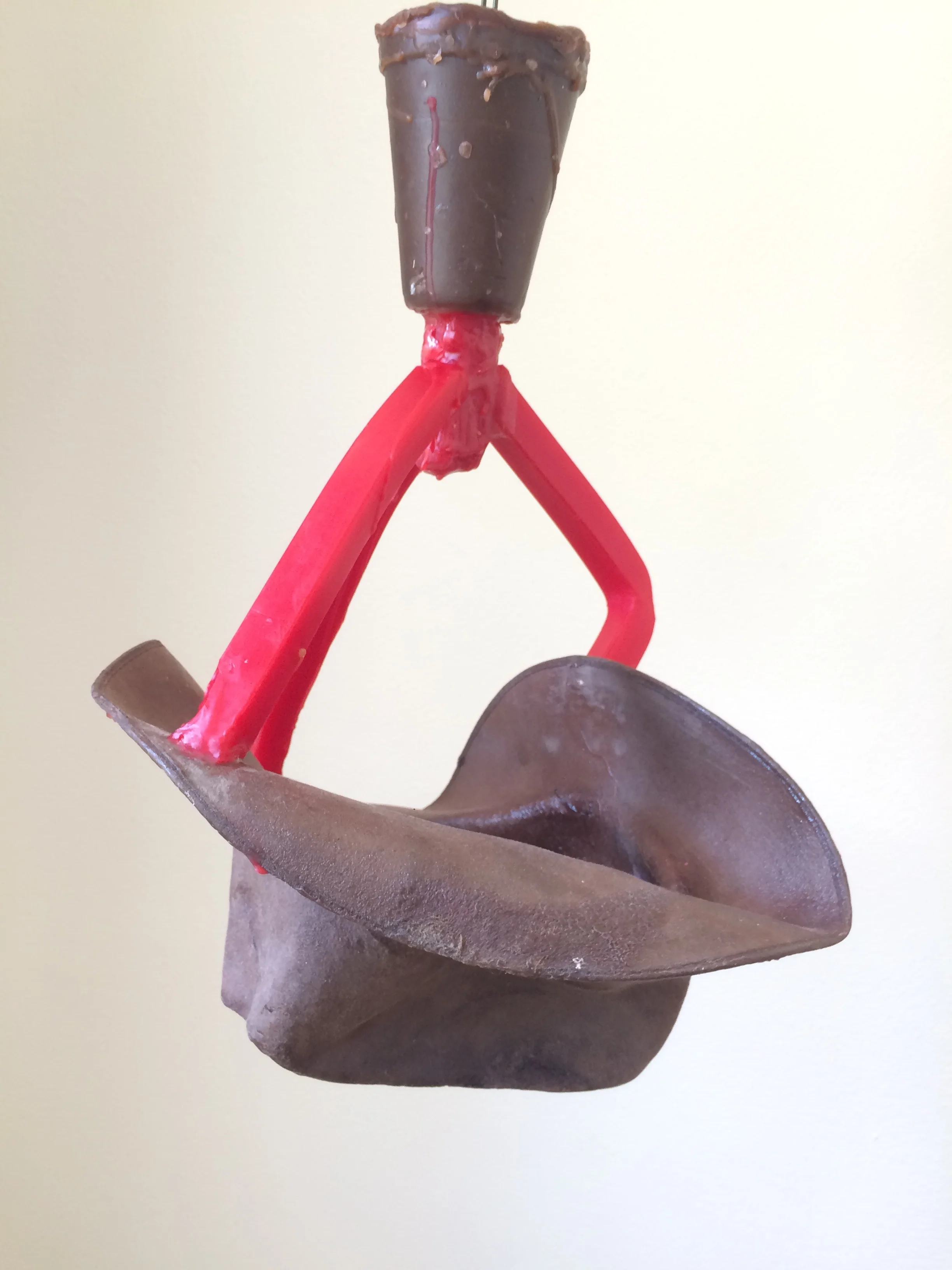 Cup and 3 1" sprues attached. These will create the cavities the bronze flows through to get into the sculpture. 
