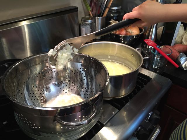  We strained the curds from the whey.   