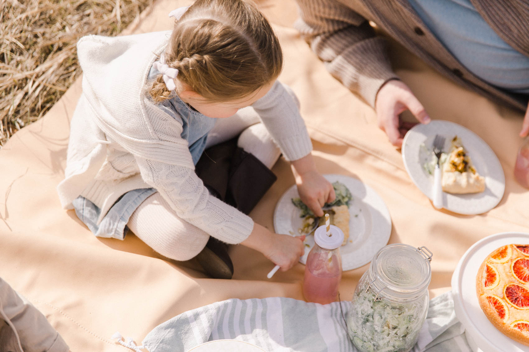 Outdoor Easter ideas in Calgary, egg hunt and picnic family photographer Jennie Guenard Photography