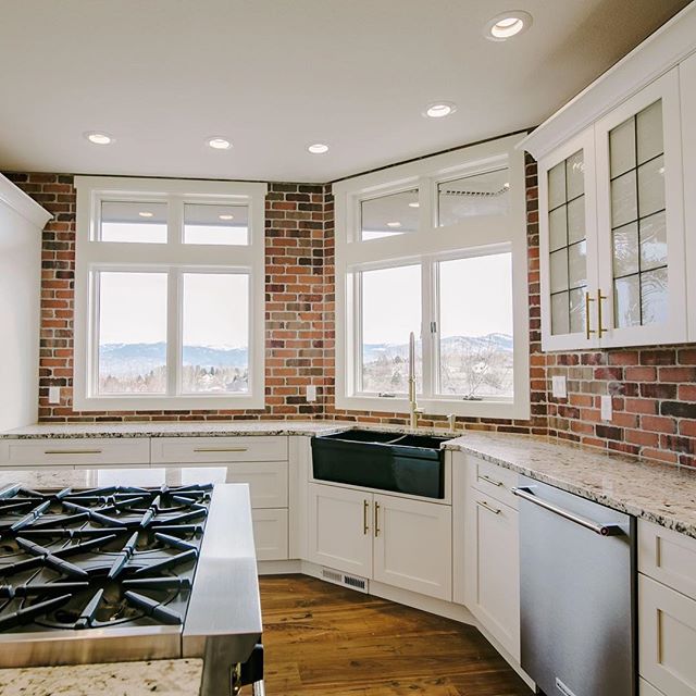 Would you welcome brick walls in your kitchen. I was worried about the mess until someone wise pointed out the range is on the opposite side of the kitchen away from the brick.