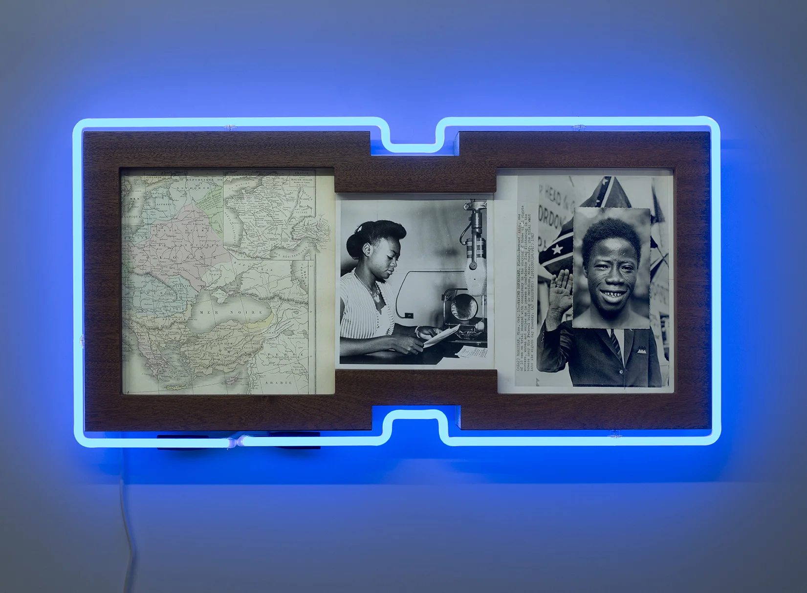 Sunset II , 2016 19th century map, paper, press photography, postal card, Sapelli wood, neon 39 x 75,9 x 10 cm