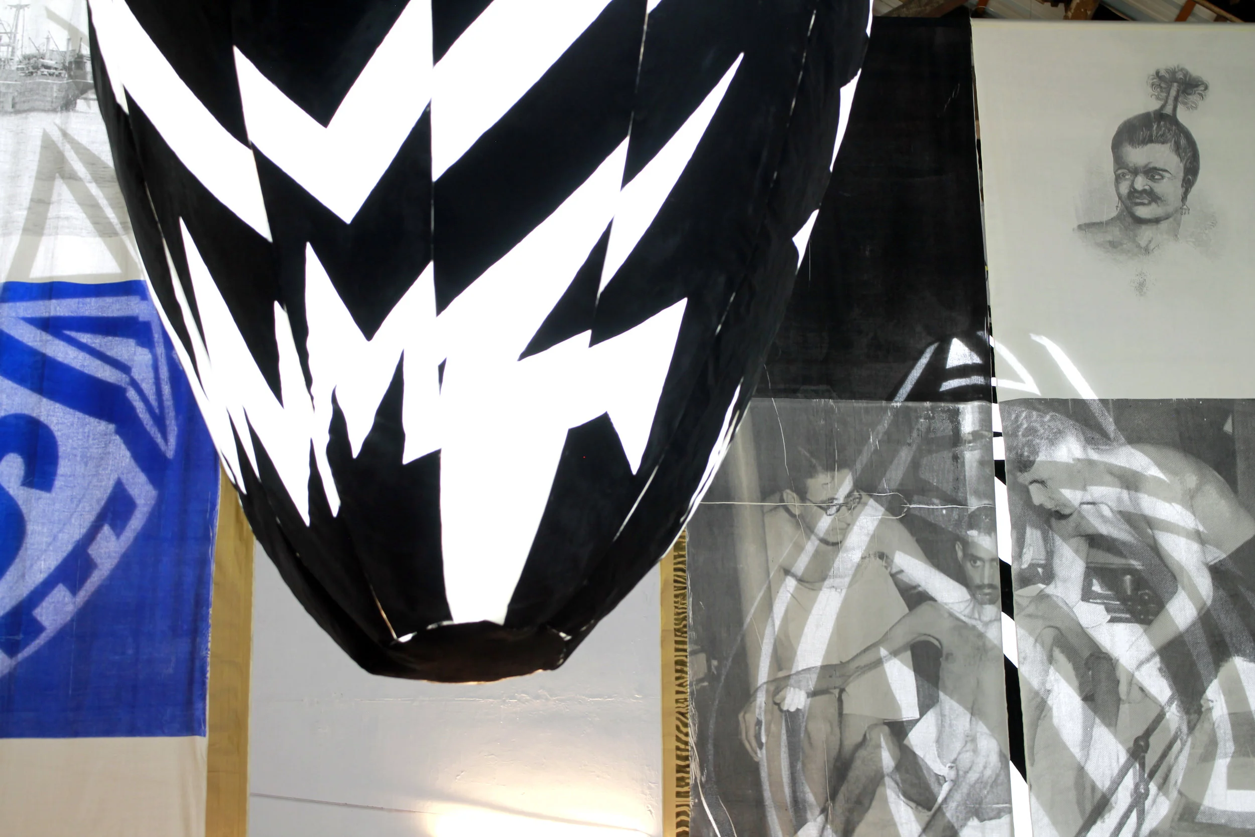   The Space Between , 2018  site-specific installation of two artworks  Seeing I-IV  (inflatable sculptures) &amp;  Inconsequential I-VI  (screen-printed textile).  Dimensions variable  Cotton, polyester, paint, fan blower and metal. 