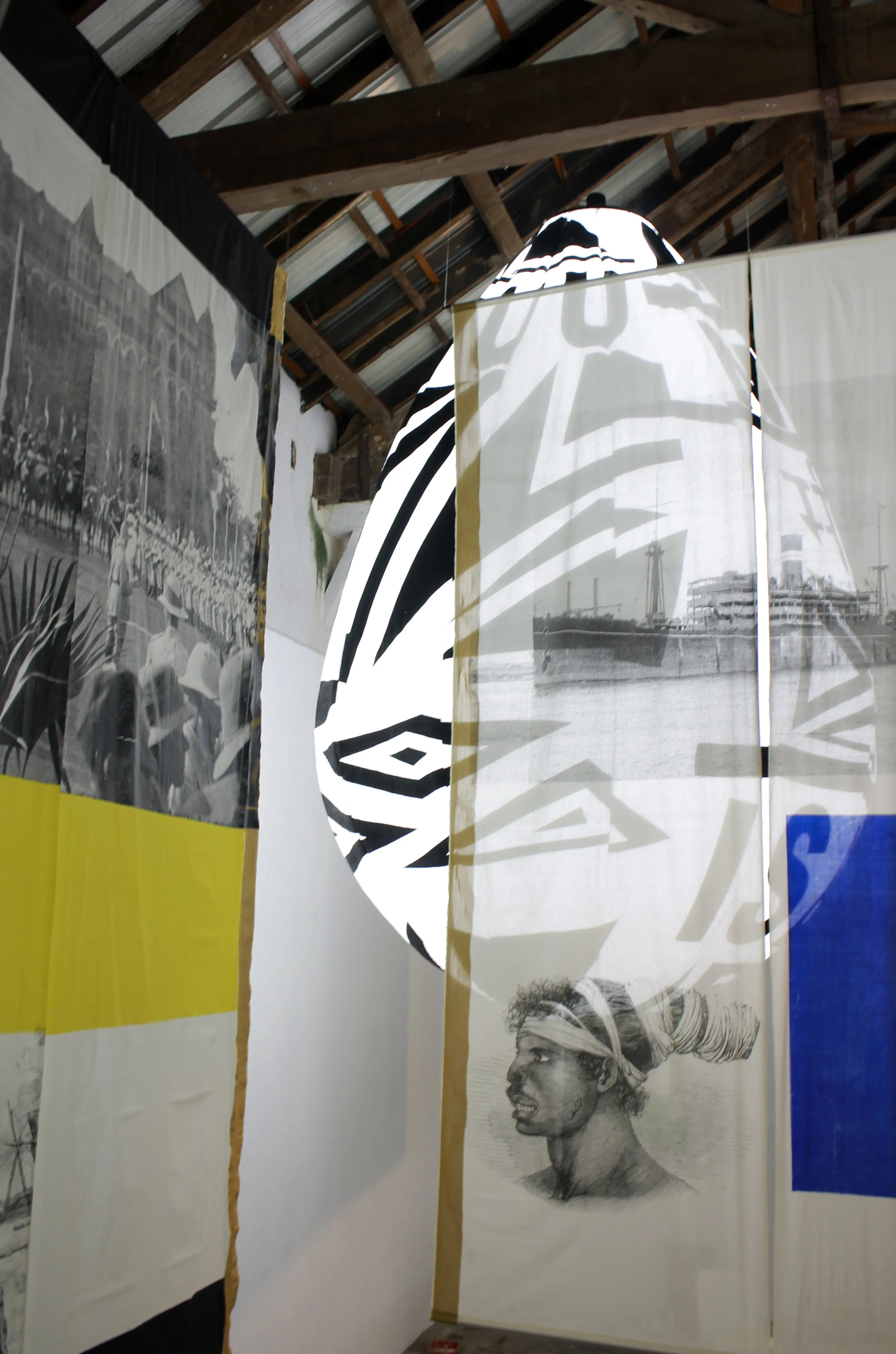   The Space Between , 2018  site-specific installation of two artworks  Seeing I-IV  (inflatable sculptures) &amp;  Inconsequential I-VI  (screen-printed textile).  Dimensions variable  Cotton, polyester, paint, fan blower and metal. 