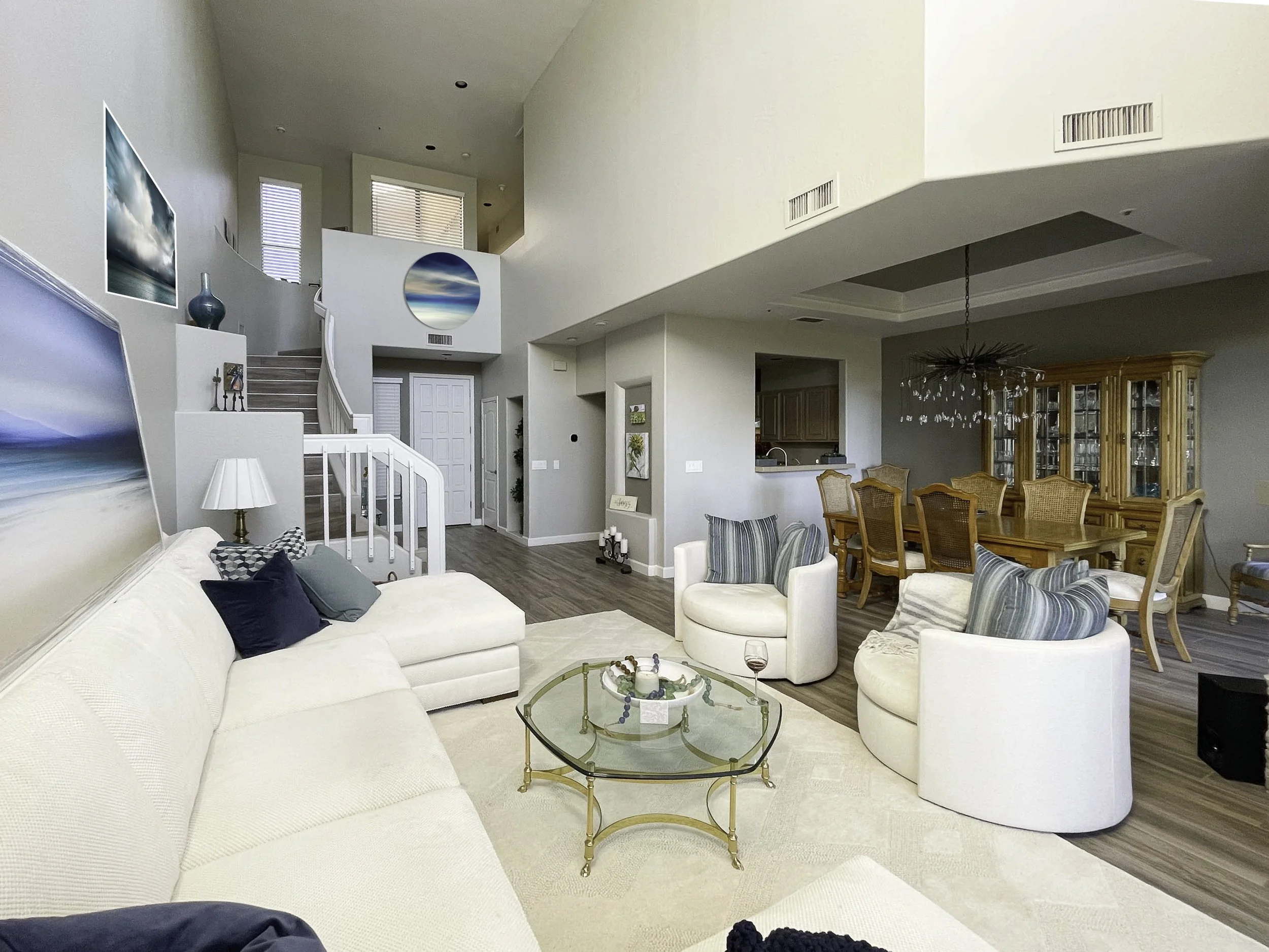 Atmospheric seascape in shades of teal and turquoise were used to complement the panoramic core in the living space. 