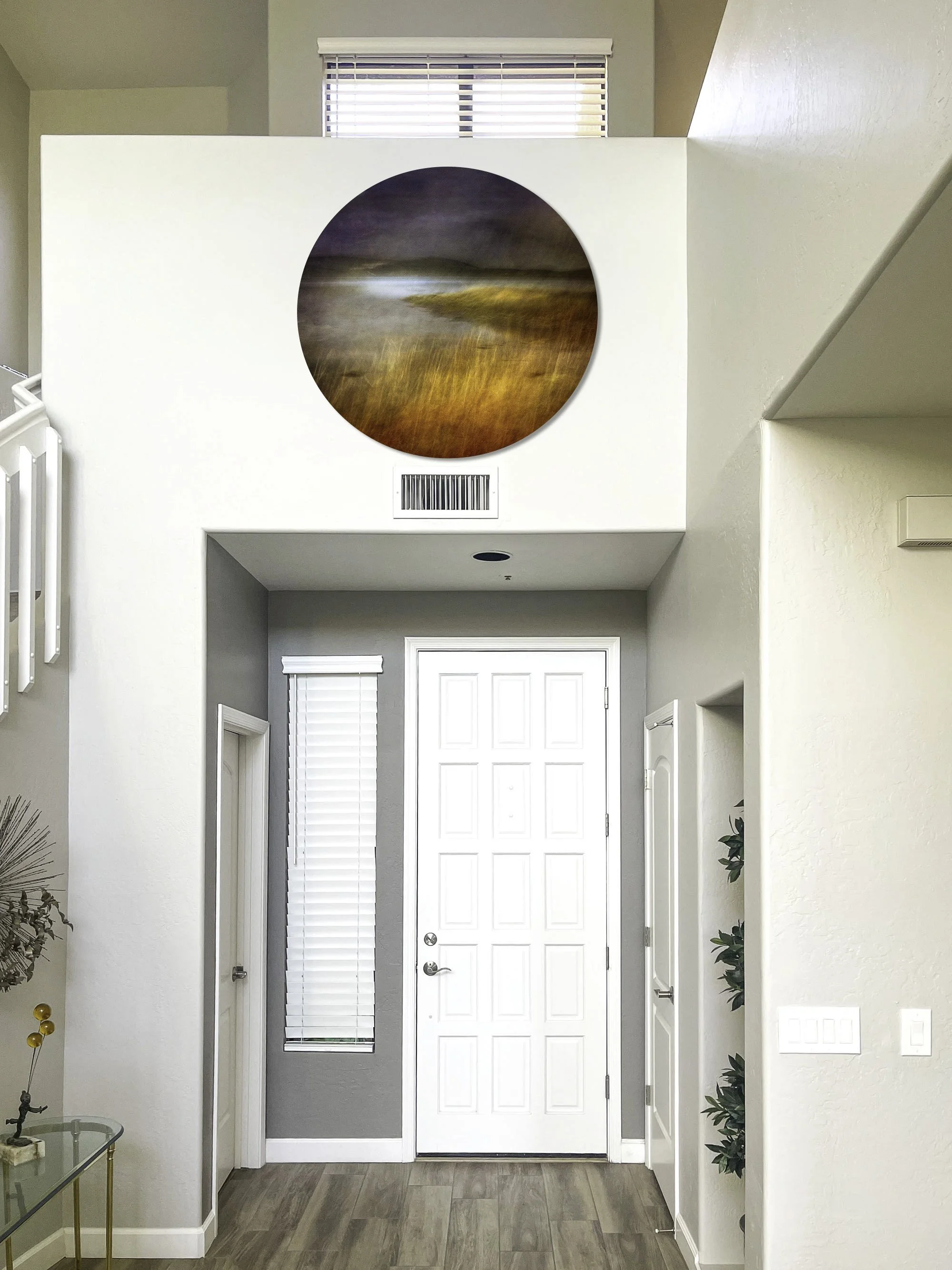 A variety of circular art pieces were assessed for the entryway