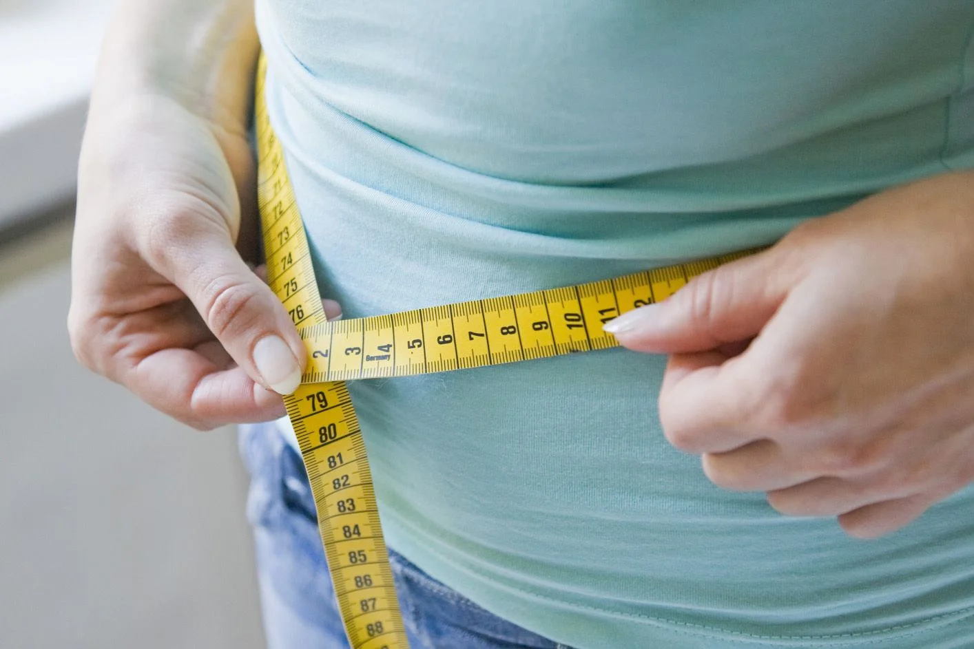 measuring-waist-GettyImages-84057051-58078ea33df78cbc2840c4c5.jpg