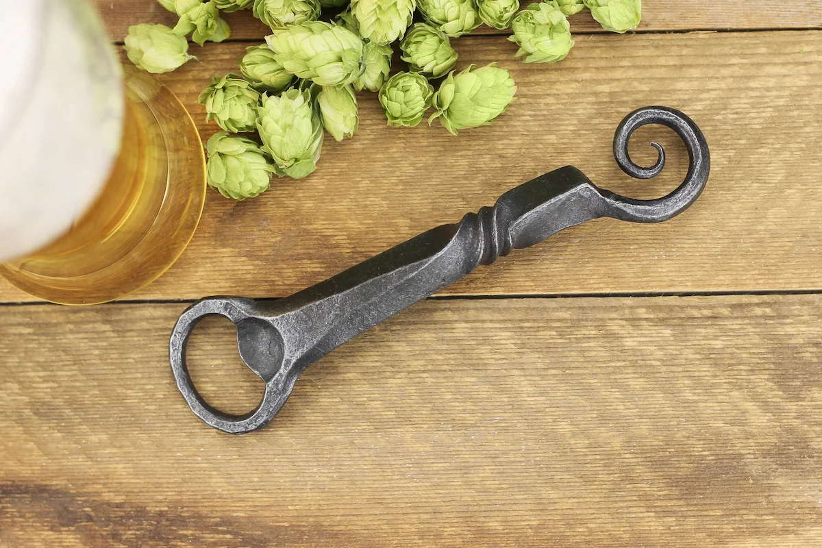 Hand forge scroll end style bottle opener.