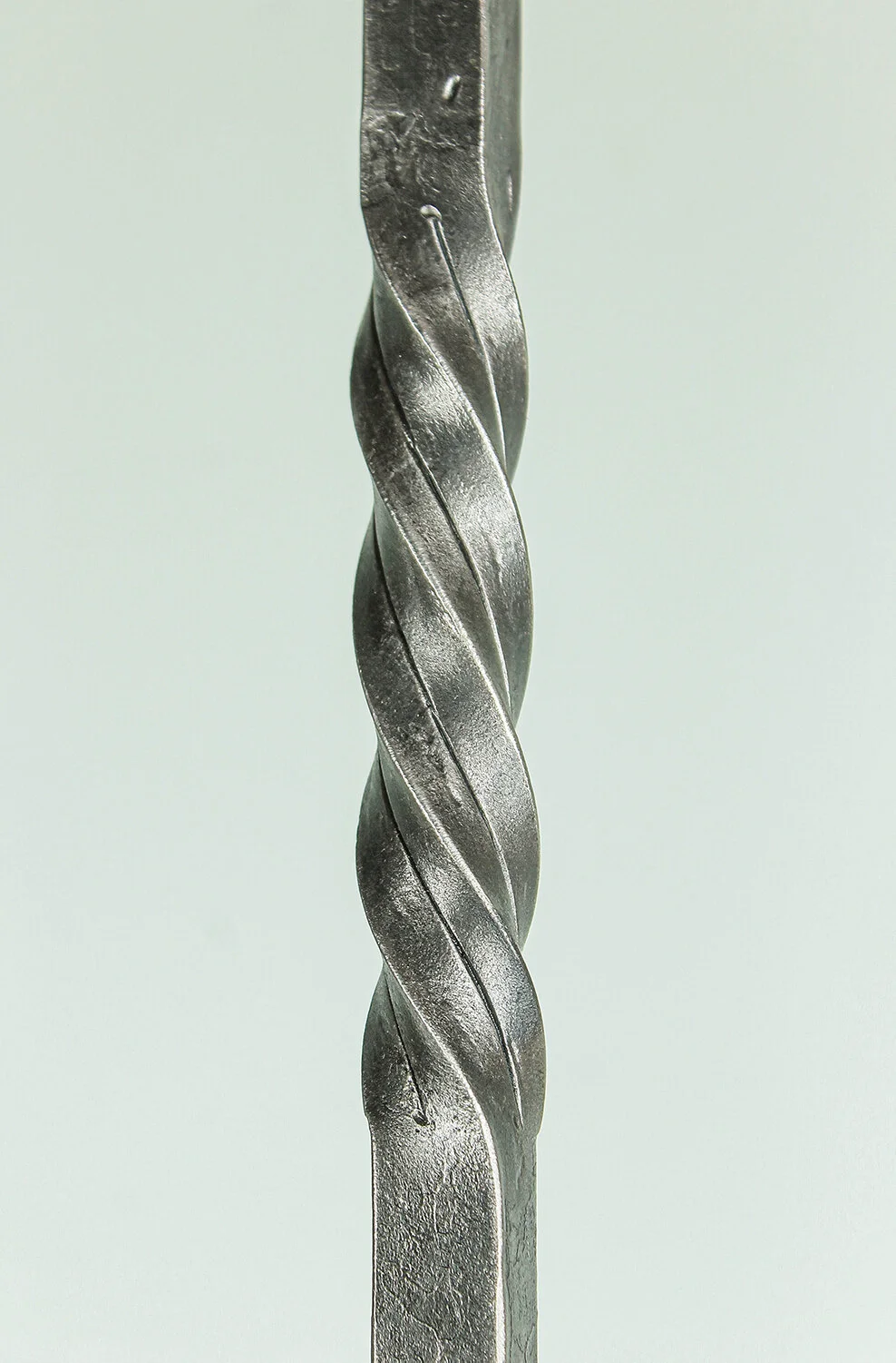 Detail of twisted metal handle.
