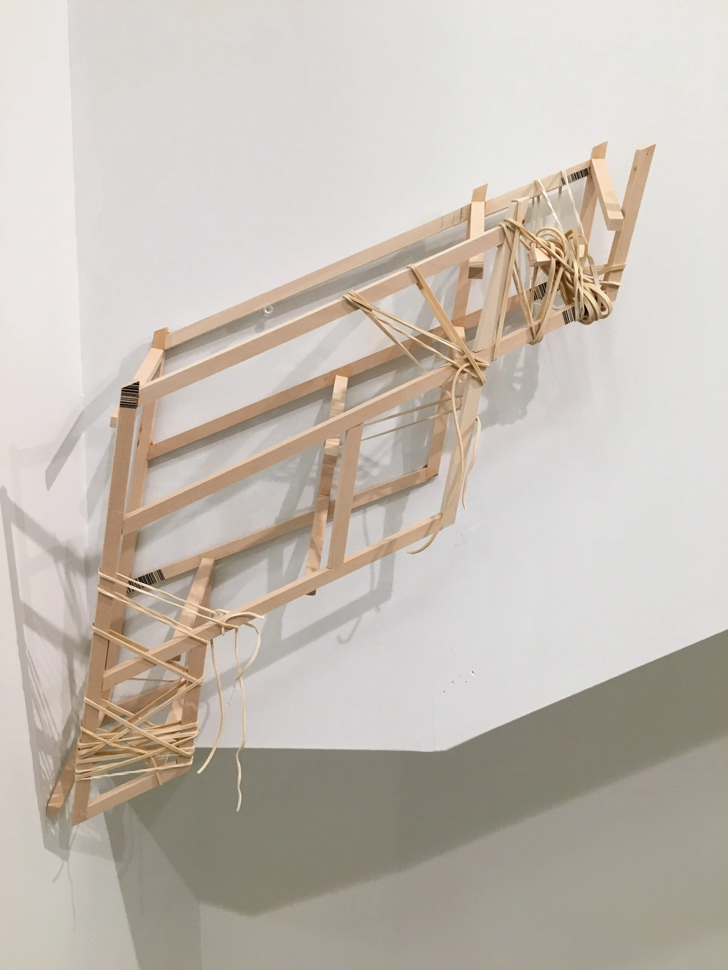  wood and rubber bands. approximately 14 in  x 22 in.  