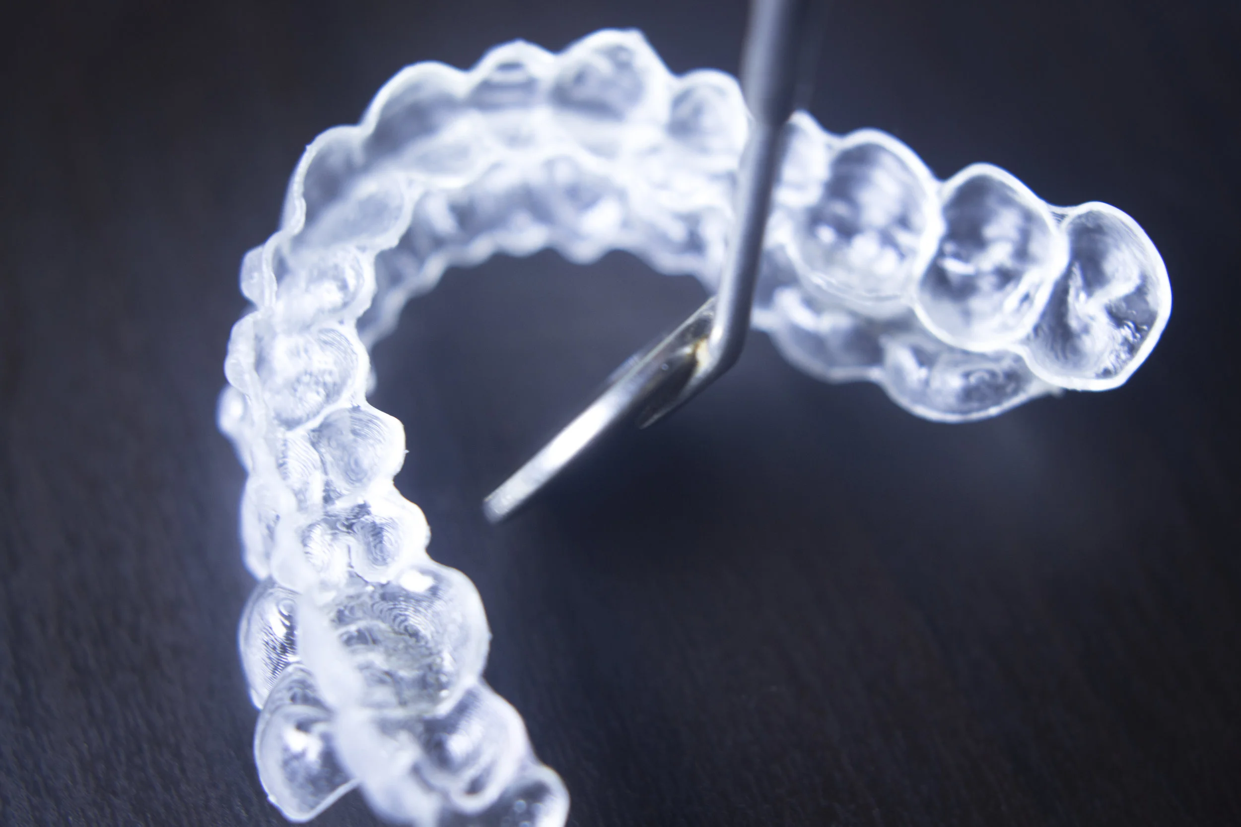 Invisible teeth aligners