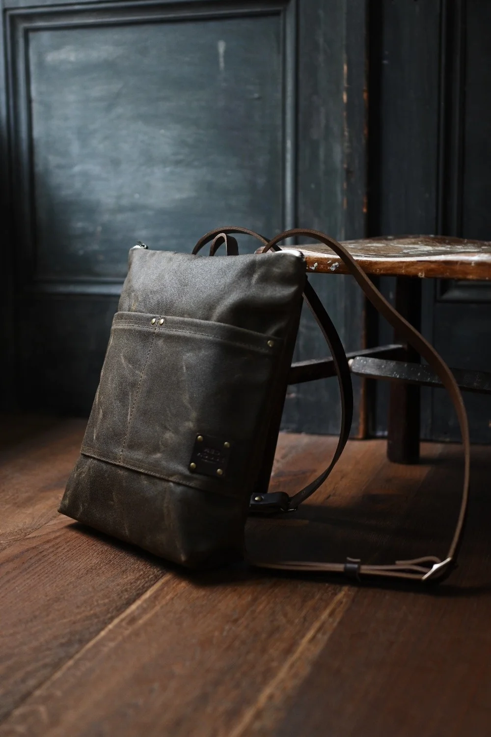 WAXED CANVAS BACKPACK — RED HOUSE