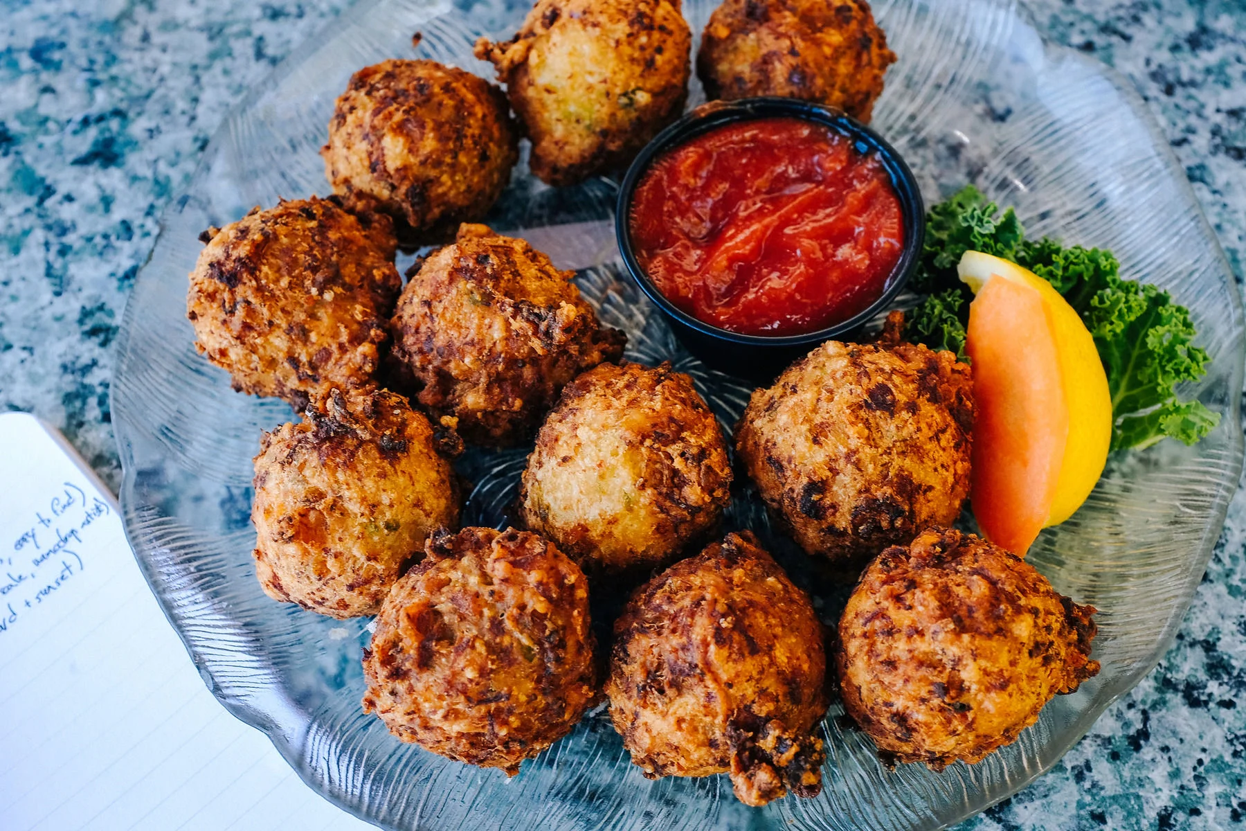  Be sure to order like a local, and always start with conch fritters. These fried nuggets of onion, garlic and snail meat are delicious – thankfully they can be found just about anywhere. Our favorites are at a colorful dive just as you enter the key