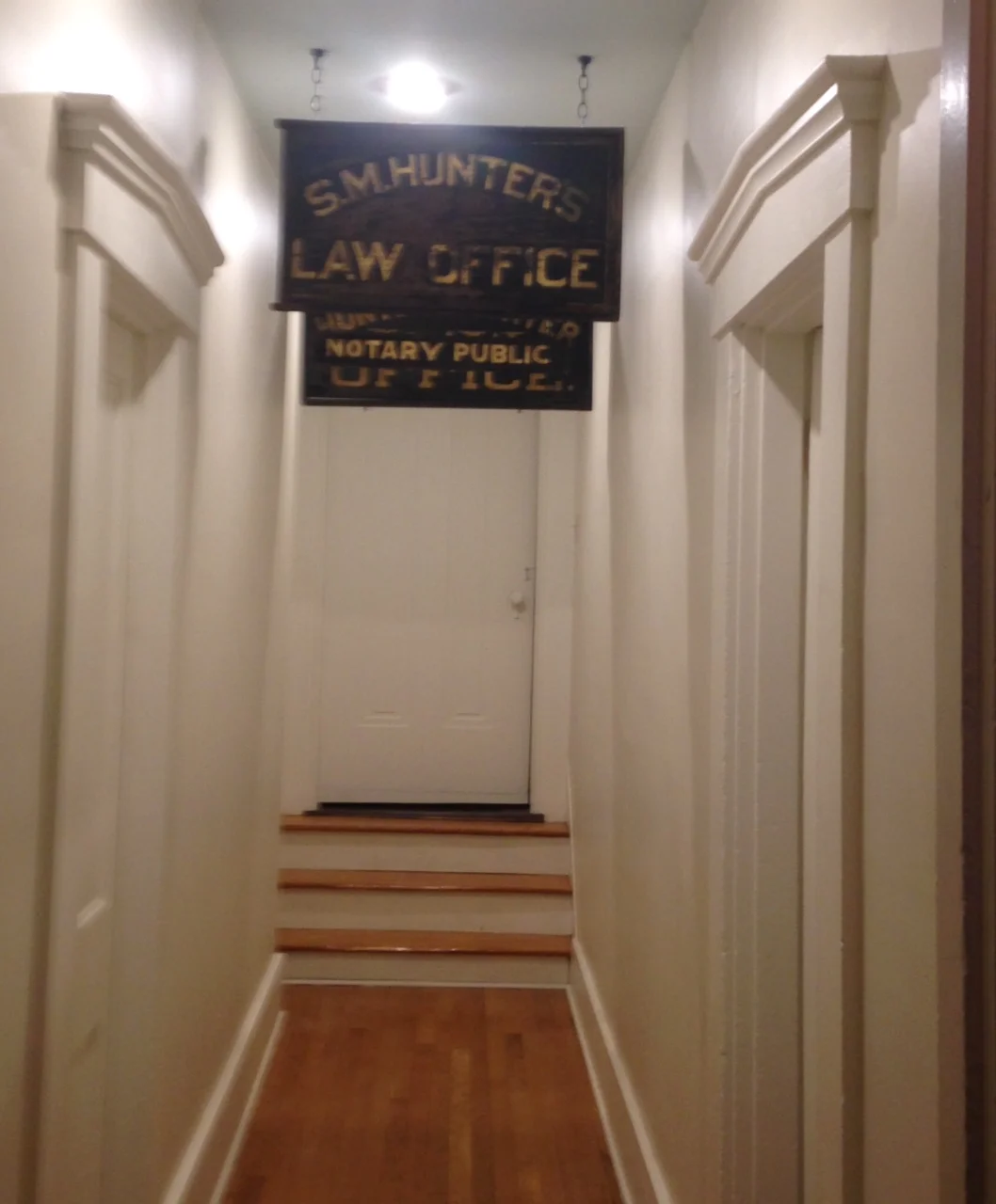 The black and gold leaf signs were used to advertise the law office of Robbins Hunter, Sr. and his father Samuel Hunter, in Newark, both lawyers and judges.