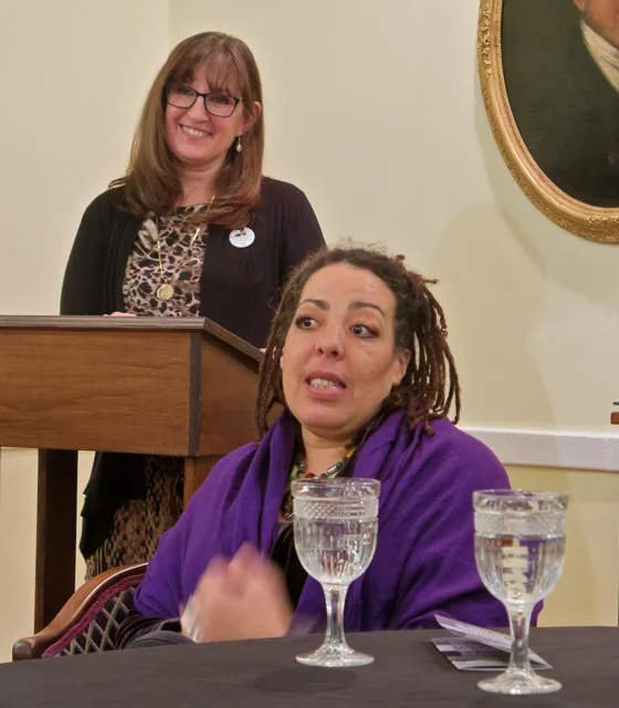 Dr. Judith Dann kicked off the evening with a brief history of Victoria Woodhull's life. Woodhull was born in Homer, Ohio. Also shown is panelist Rachel Marco-Havens.