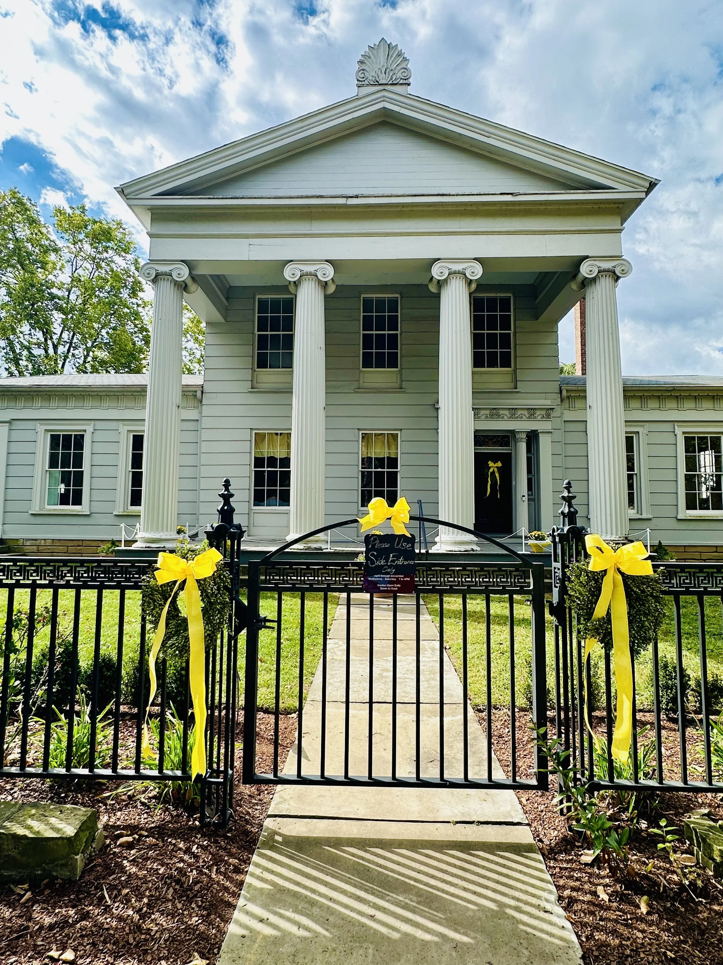 front of museum with yellow ribbons.jpg