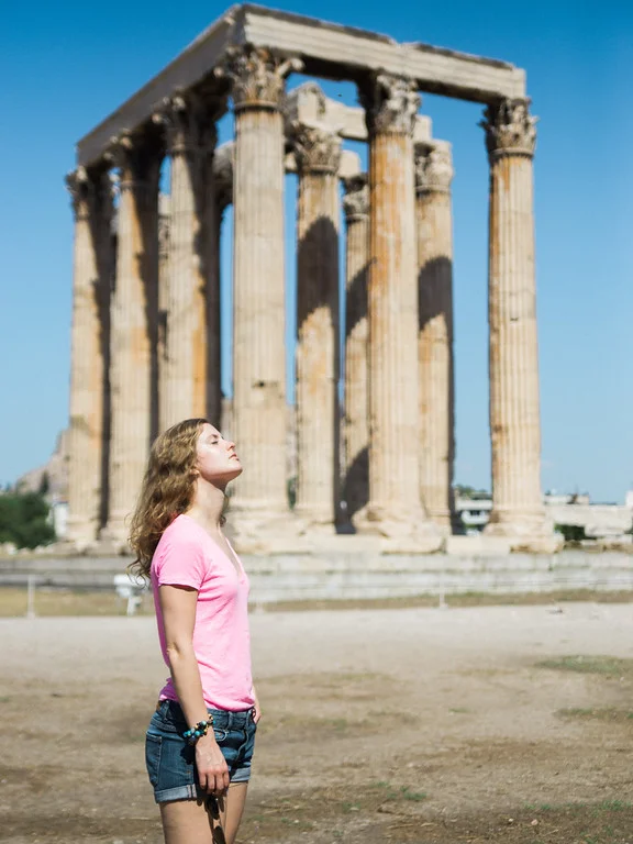 Catching rays by the ruins that are left behind from the Temple of Olympian Zeus. Was terribly hot out!