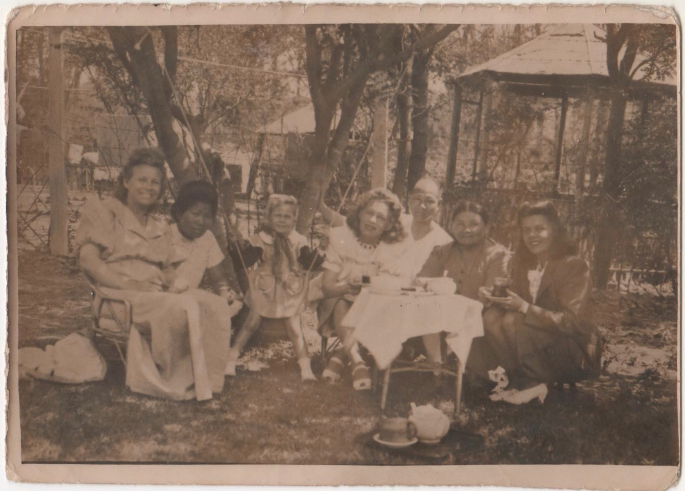 Anna and her family at their summer place in Qingdao. From left: Anna's mom, Lydia; Mary, a maid; Anna; Anna's Aunt Sandra; Akho, the cook; Anna's Auntie Margarita; and Anna's Aunt Lucy. 