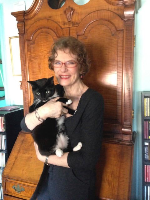Caroline with her cat Bruce, "the love of my life. We have a delightfully contentious relationship."