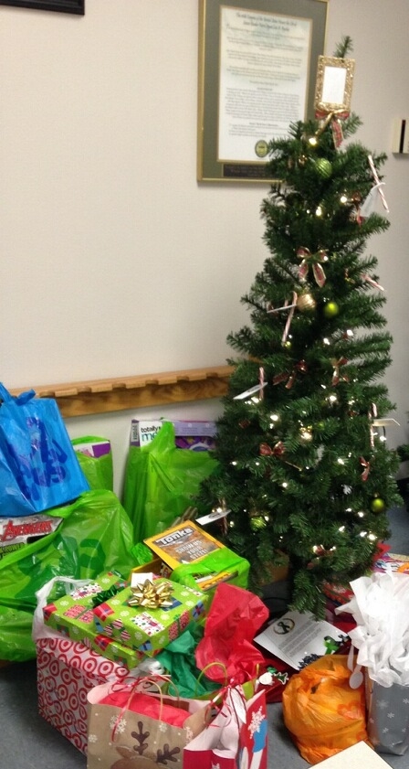 The process starts here where the Agents give gifts by placing them under the tree.