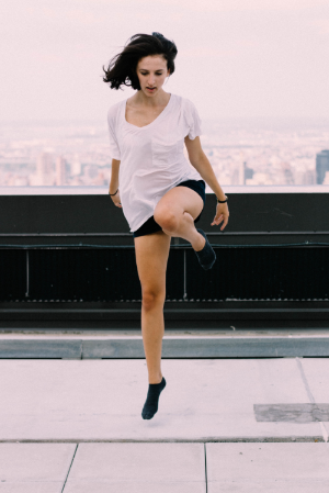 I shot this with a very fast shutter speed to capture Christina's motion.