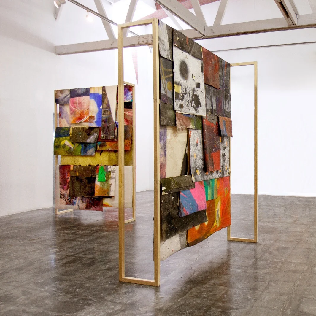 IAIN MUIRHEAD 18100:18135, 2018. Peripheral painting aggregate (2014-2018) systematically folded and draped on wood support. Diptych, 95.7 x 73 x 35.7 inches each. Installation view Finishing Concepts, Monterey Park. Photo credit: Evan Trine.