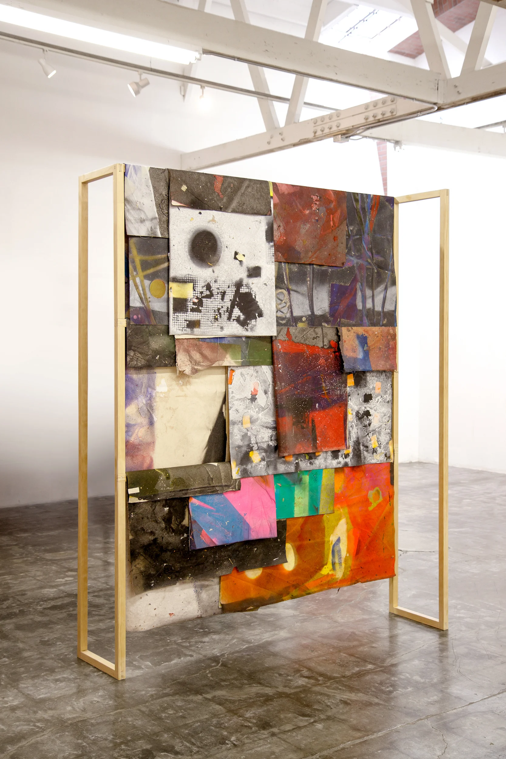 IAIN MUIRHEAD 18100:18135, 2018. Peripheral painting aggregate (2014-2018) systematically folded and draped on wood support. Diptych, 95.7 x 73 x 35.7 inches each. Installation view Finishing Concepts, Monterey Park. Photo credit: Evan Trine.