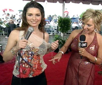 With Shania discussing her cool outfit. CMT Awards red carpet around 2005 maybe.
