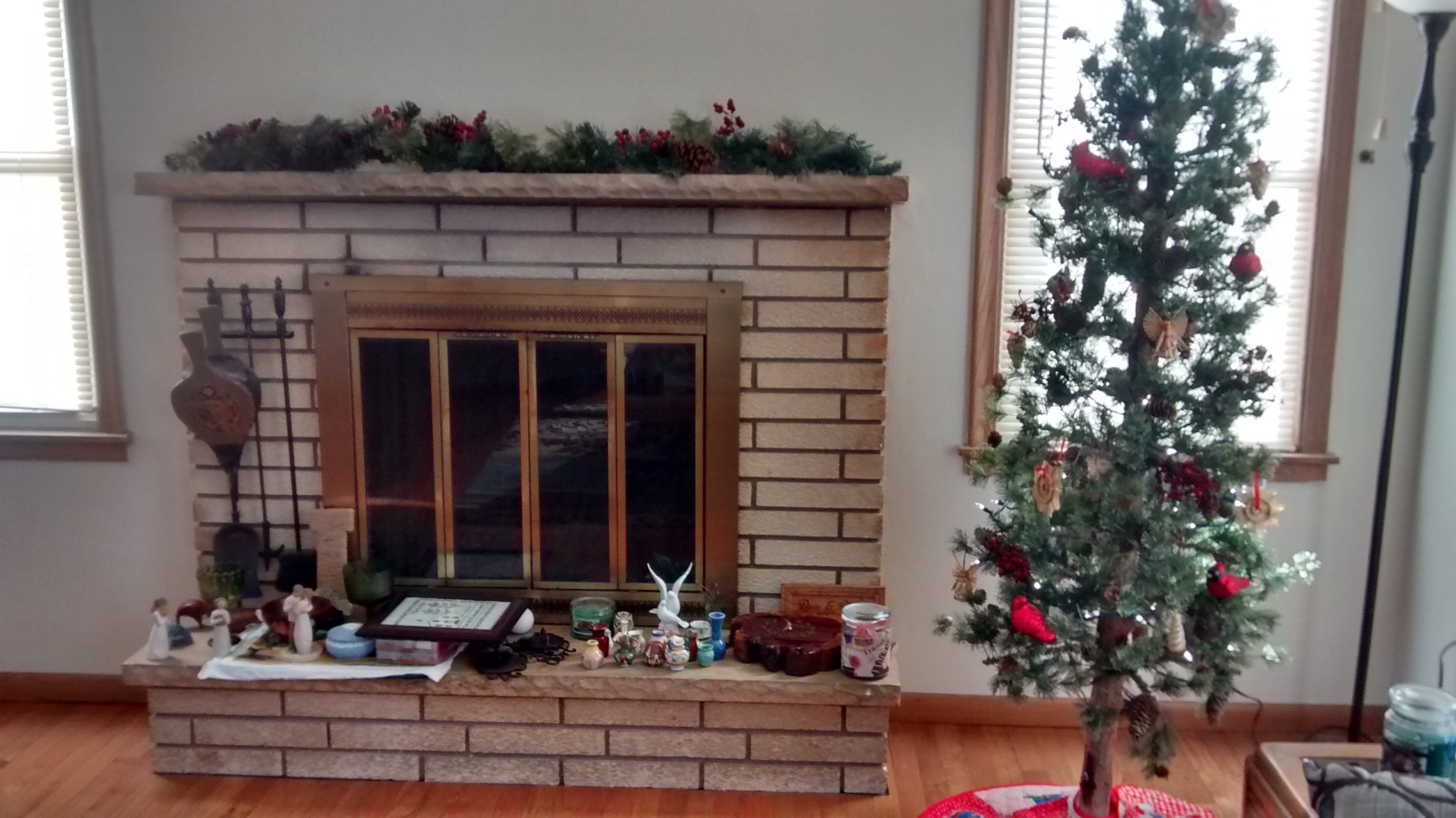 Easy decorations (garland from my Grandma, tree from my Mom) coexisting with stuff I haven't figured out where to put yet.