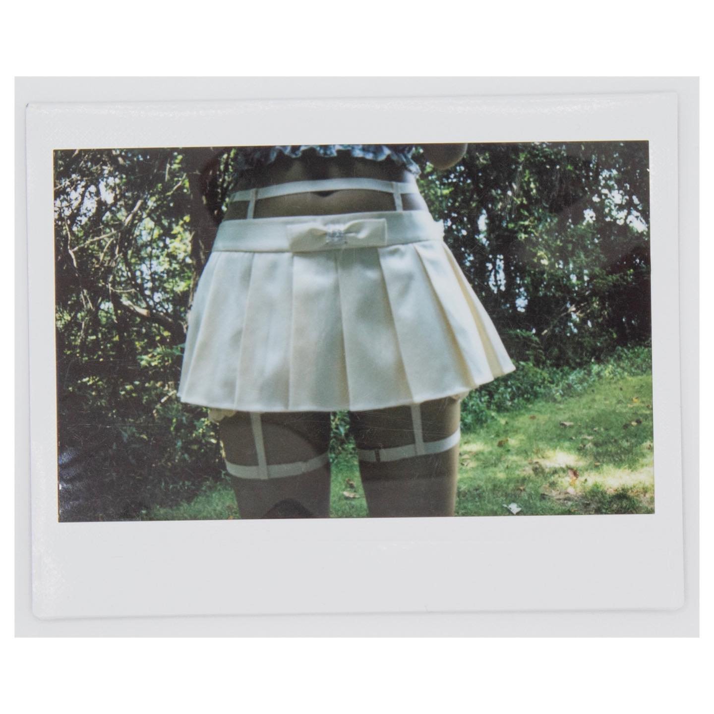 Closeup of the Modiste Garters. I brought an instax on this season&rsquo;s shoot and I 🏹 how they came out!