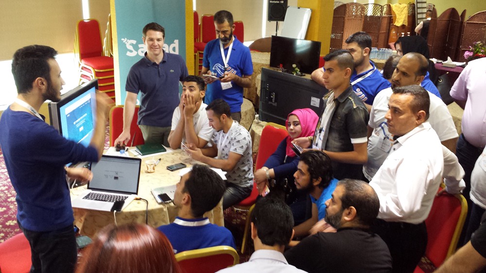 Facebook engineer Murtadha Al Tameemi and technologist Brian Forde train on Bitcoin in Basra